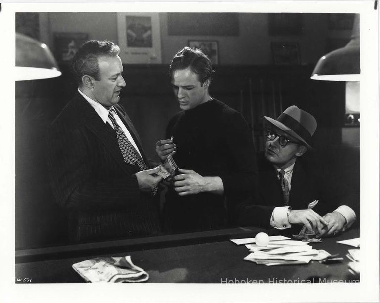 B+W publicity photo of Lee J. Cobb as Johnny Friendly and Marlon Brando as Terry Malloy in film 