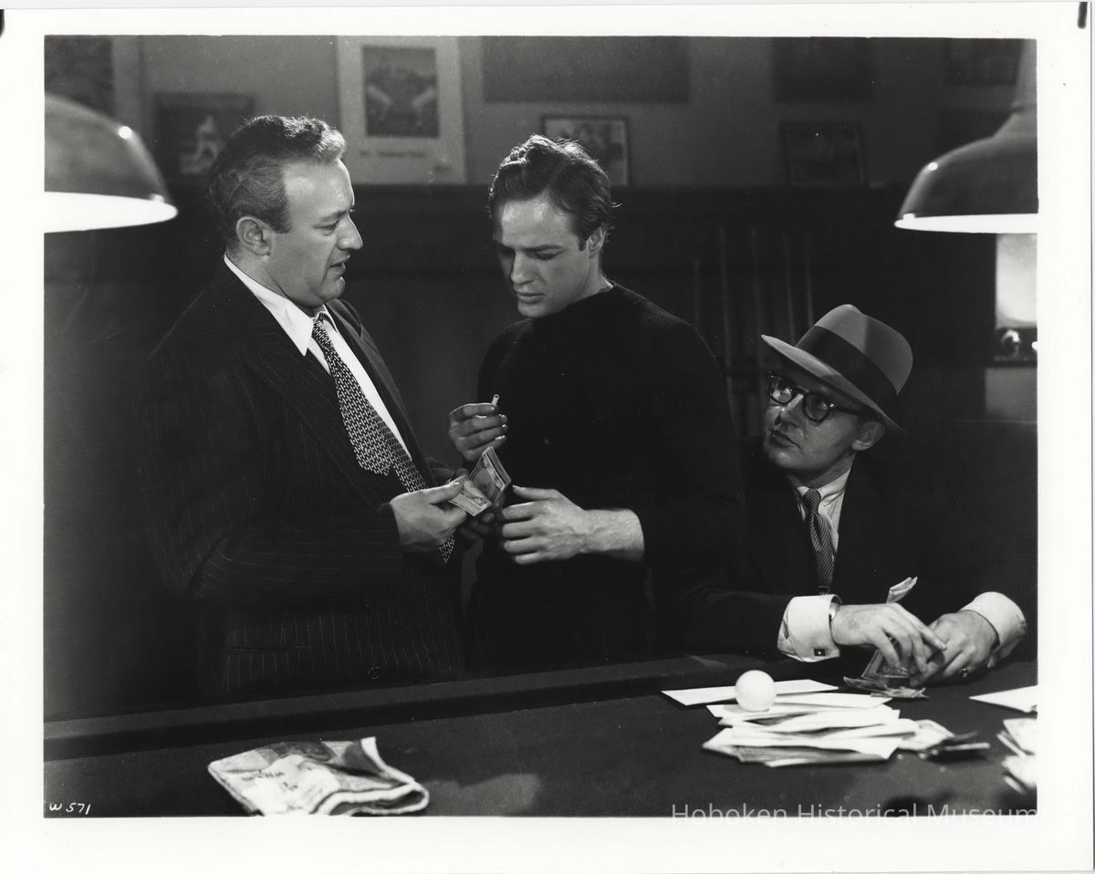 B+W publicity photo of Lee J. Cobb as Johnny Friendly and Marlon Brando as Terry Malloy in film 