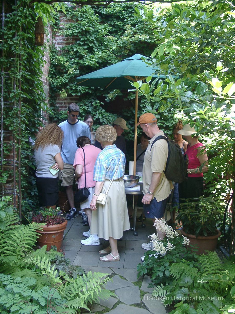 Digital color image of the gardens and people on the Secret Gardens Tour, Hoboken Historical Museum, Hoboken, June 9, 2002. picture number 1