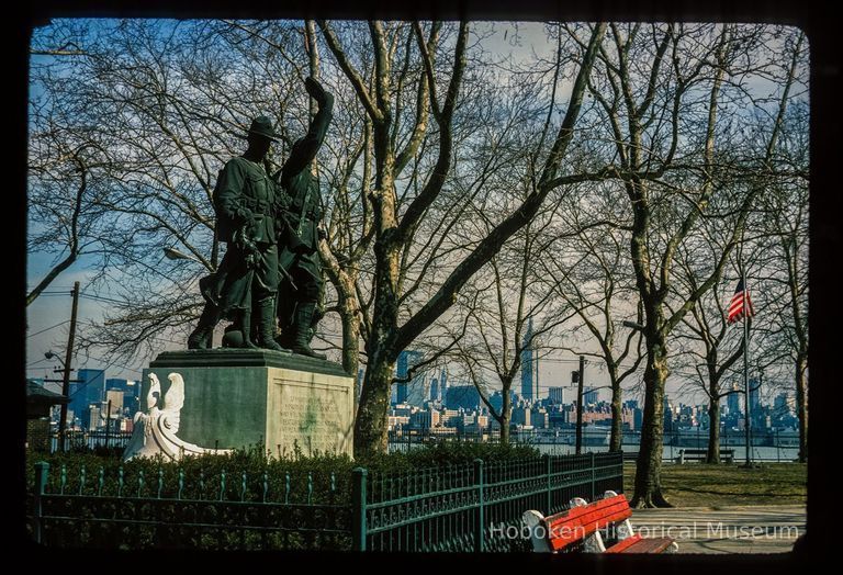 Color slide of eye-level view of The Soldiers' & Sailors' Monument in Elysian Park looking E with the New York City skyline in the background picture number 1