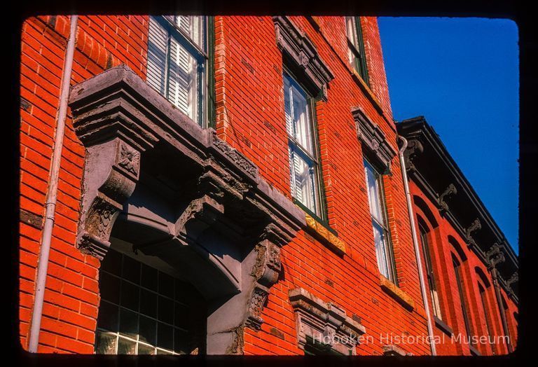 Color slide of detail view of pediments and brackets on a building at an unidentified location picture number 1