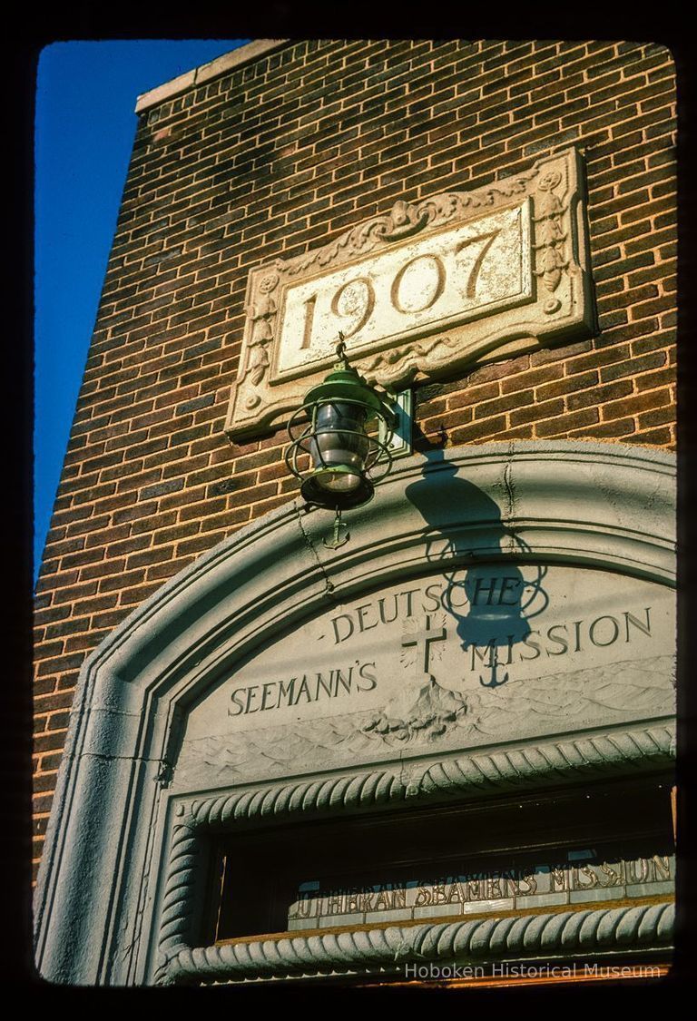 Color slide of close-up view of portico frieze reading 