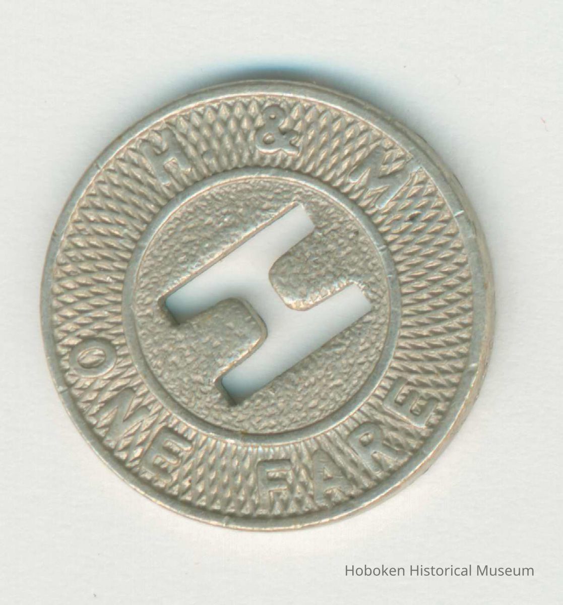 Metal coin token of the Hudson & Manhattan Rail Road, no date, ca. 1944. picture number 1