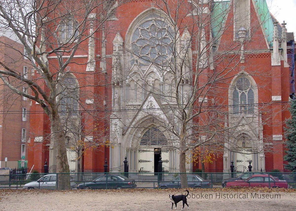 Digital image of the dog run in Church Square Park with Our Lady of Grace Church, Hoboken, March 31, 2004. picture number 1