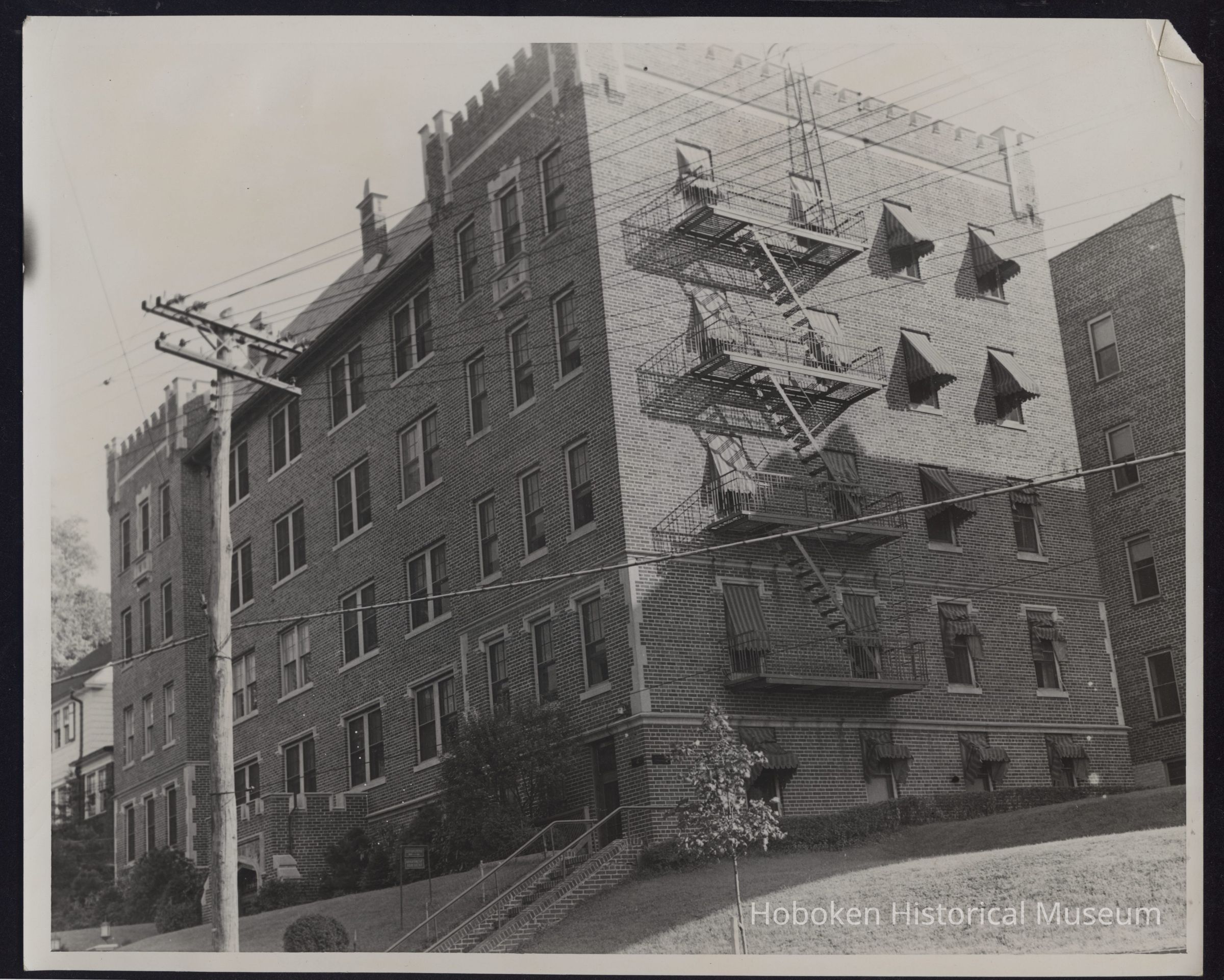 B&W photo of apartment building at unknown location in New Jersey. picture number 1
