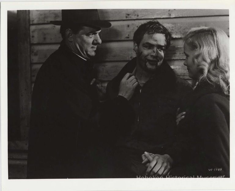 B+W publicity photo of Marlon Brando as Terry Malloy with Karl Malden, Eva Marie Saint in film 