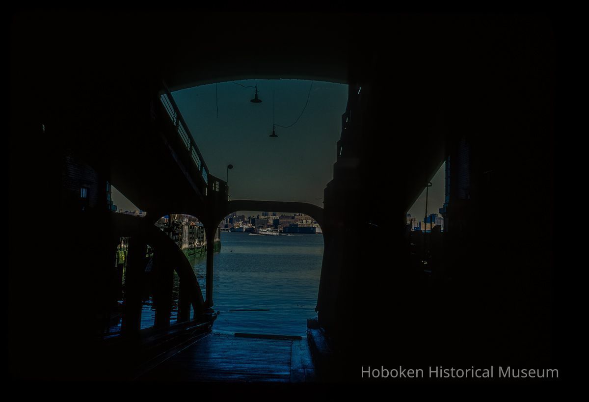 Color slide of eye-level view of the Hudson River and New York City looking E from inside the Lackawanna Terminal picture number 1