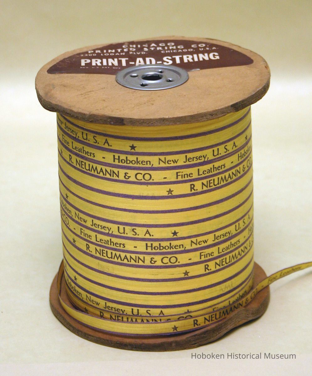 Spool of printed ribbon: R. Neumann & Co., Fine Leathers, Hoboken, New Jersey, U.S.A. No date, ca. 1960's-1970's. picture number 1