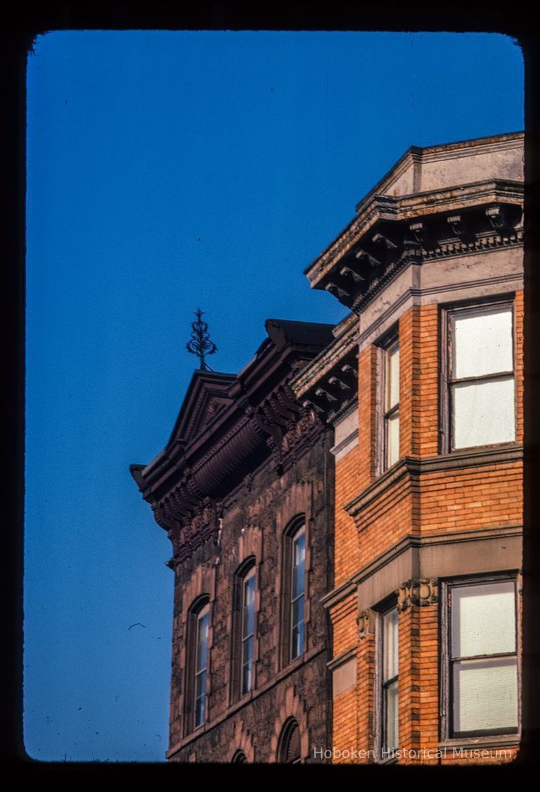 Color slide of close-up view of cornices, pediment and finial at 1143 and 1145 Garden on the SE corner with 12th picture number 1