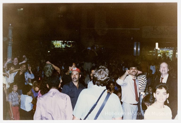 Color photo of supporters of mayoral candidate Tom Vezzetti in front of City Hall on election night, Hoboken, [June 11, 1985]. picture number 1