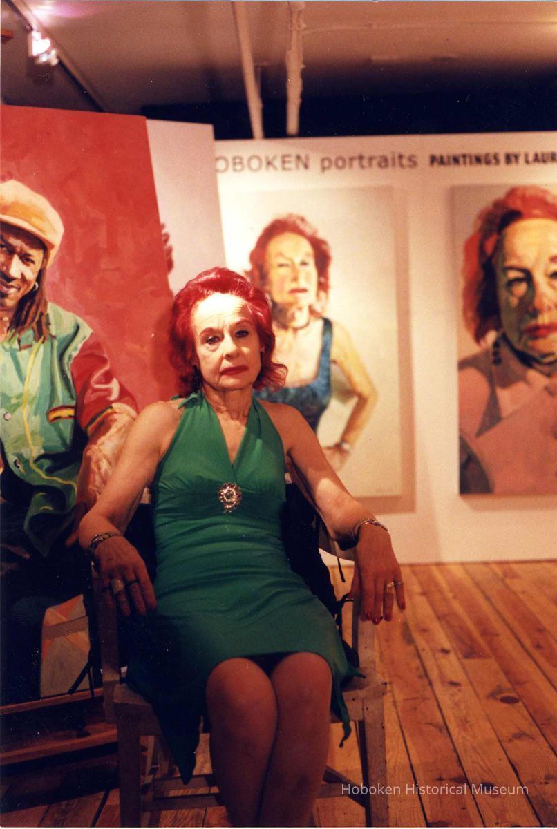 Olivia, subject of portraits seen in background