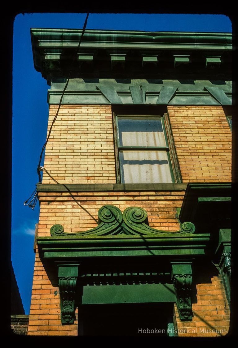 Color slide of detail view of portico pediment, cornice and dentils at 308 8th between Willow and Clinton picture number 1