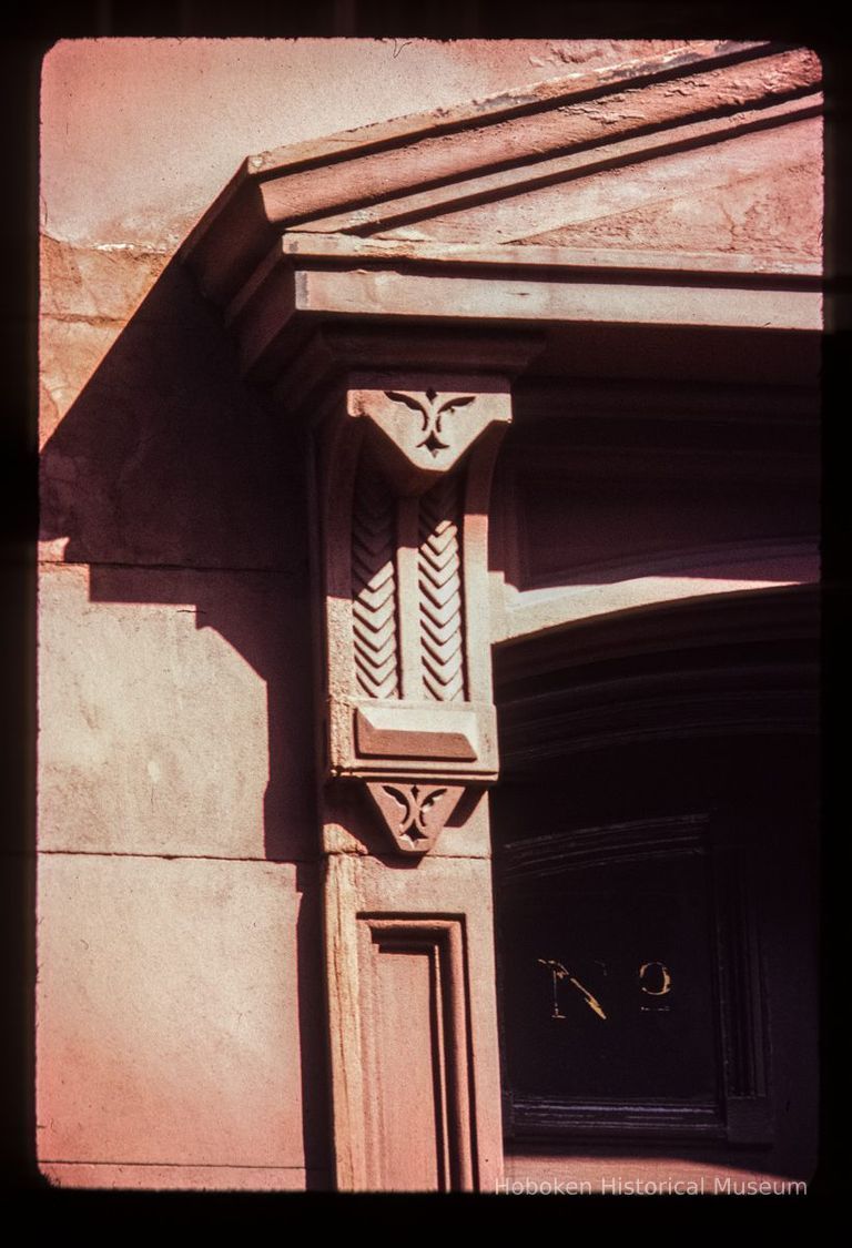 Color slide of detail view of pediment, bracket and transom window on a building on Park between 10th and 11th picture number 1