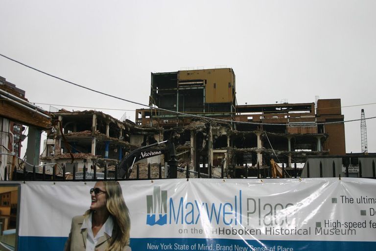 Digital color image of the Maxwell House Coffee plant site with printed vinyl fence sign banners, Hoboken, October 2004. picture number 1