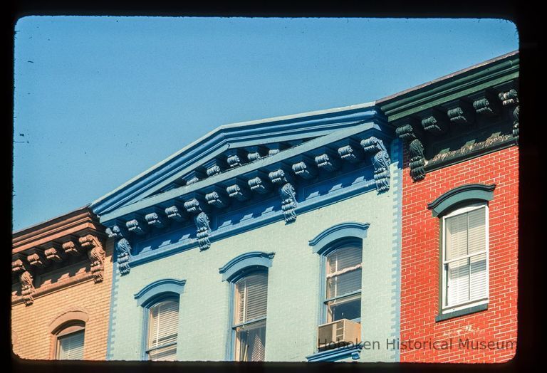 Color slide of close-up view of pediment, cornice, brackets and window heads at 413 Washington between 4th and 5th picture number 1