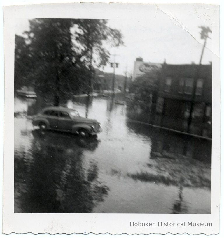 photo 1, image: flooded intersection of Harrison(?) & Paterson (?)