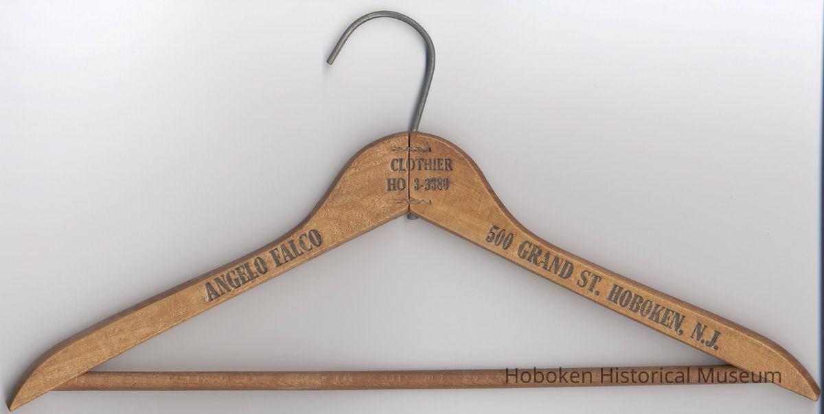 Wooden coat hanger stamped Angelo Falco, Clothier, 500 Grand St., Hoboken, N.J., ca 1950's-1960's. picture number 1
