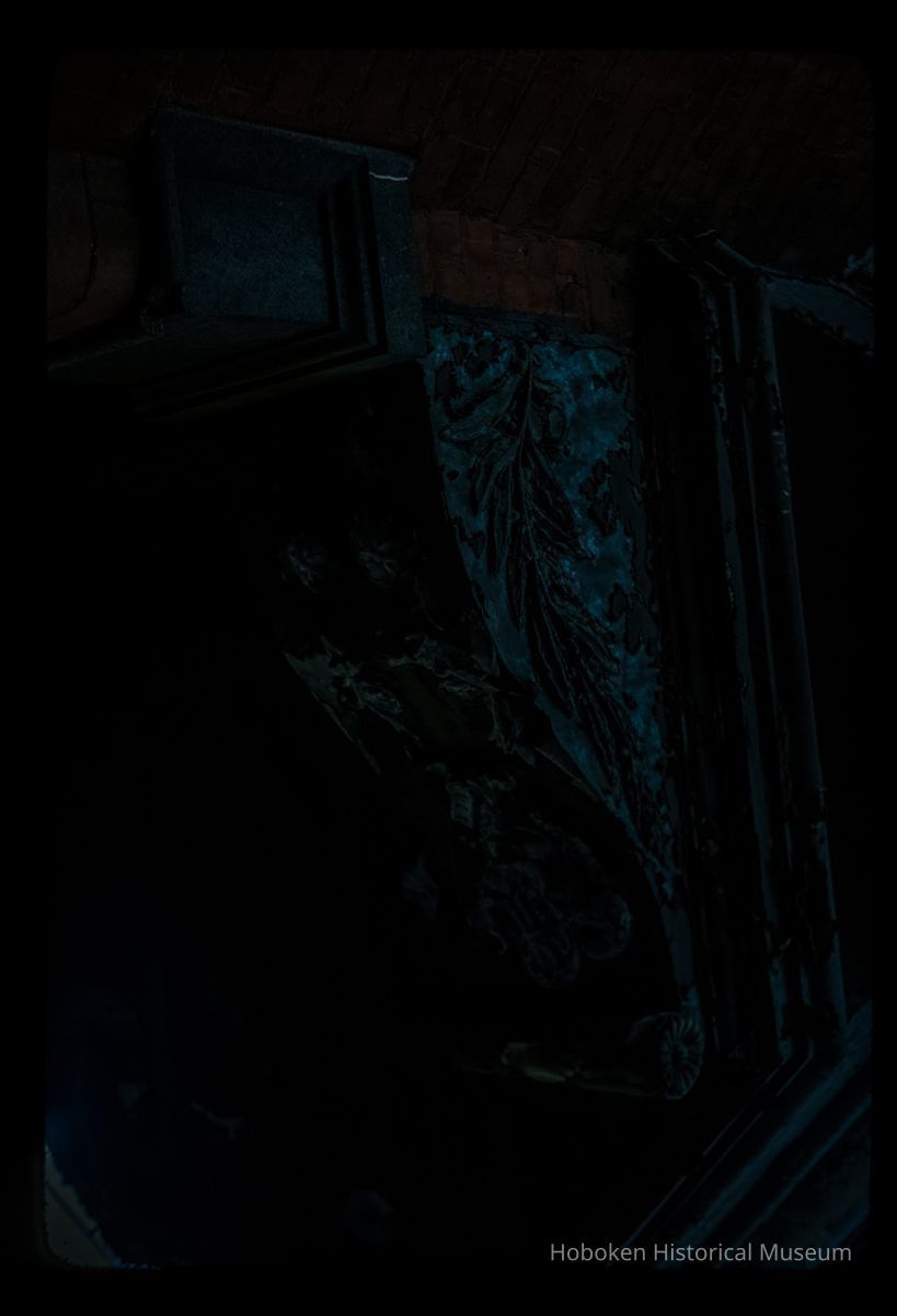 Color slide (underexposed) of close-up view of portico bracket at 300 Grand on the NW corner with 3rd picture number 1