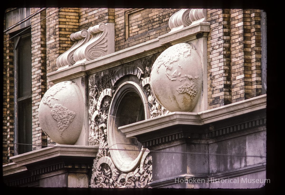 Color slide of detail view of portico keystone, oculi window, pilasters, and capitals of Public School No. 7 building at 80 Park on the SW corner with Newark picture number 1