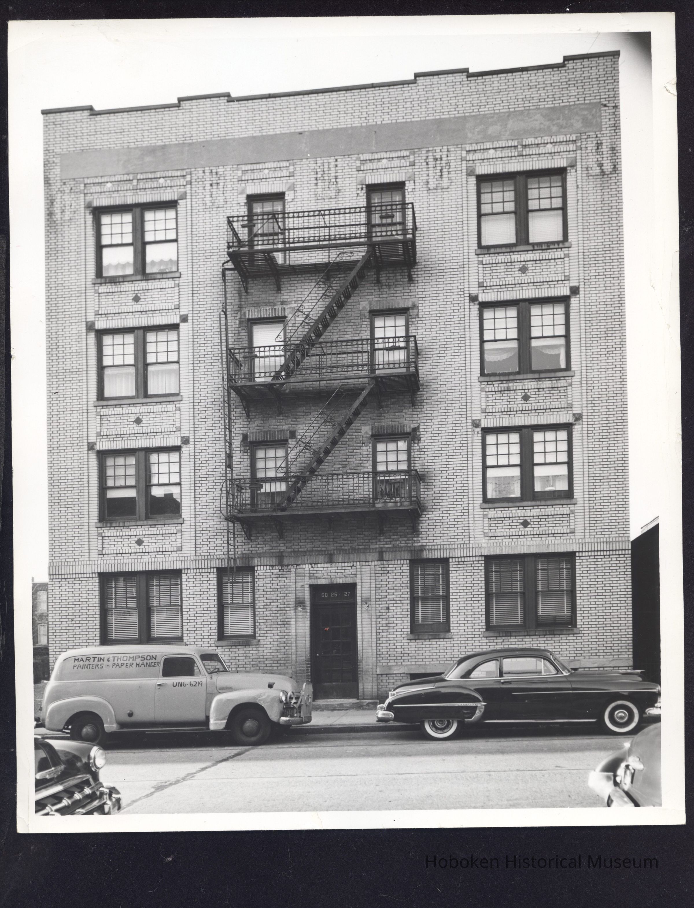 B&W photo of apartment building at 6025-6027 Hudson Avenue, West New York. picture number 1