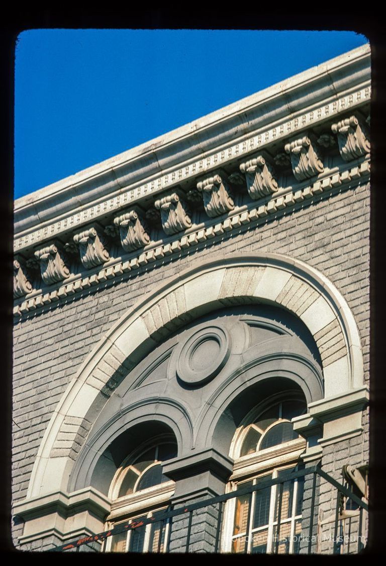 Color slide of detail view of cornice, brackets, dentils and semicircular arched windows at 829 Washington on the SE corner with 9th picture number 1