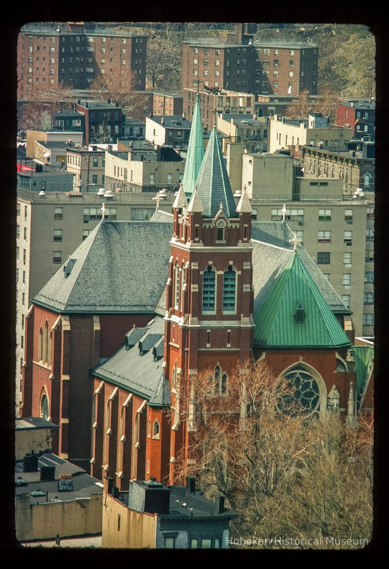 Color slide of aerial view of Our Lady of Grace Roman Catholic church at 400 Willow on the NW corner of Willow & 4th picture number 1