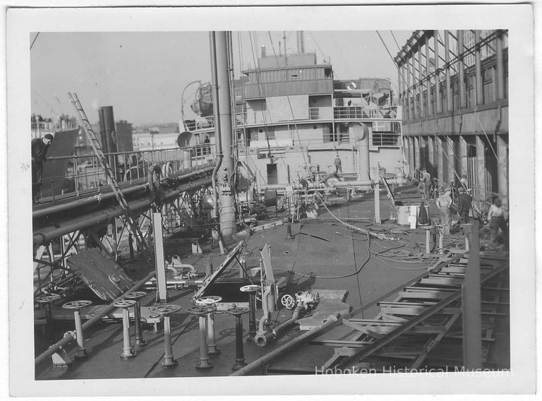 B+W photo of deck damage to unknown ship, Hoboken, no date, ca. 1940. picture number 1