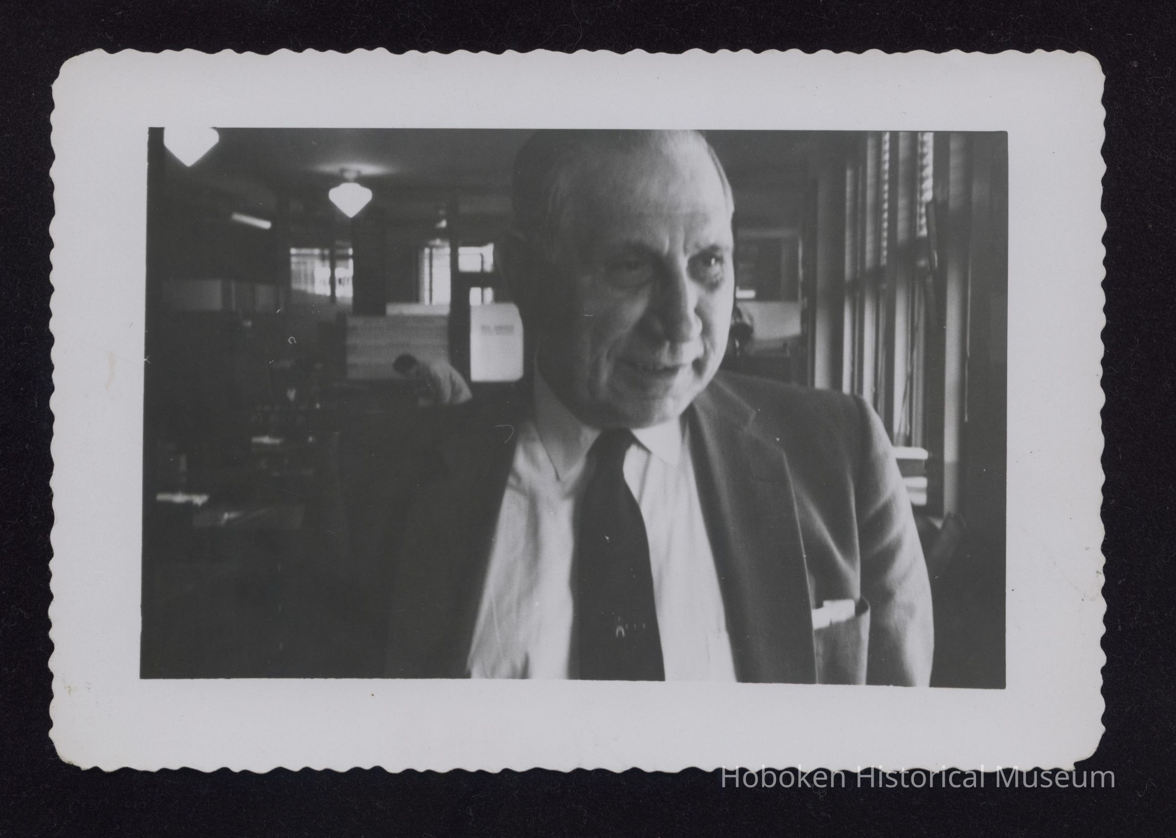 B&W photo of an unidentified employee. picture number 1