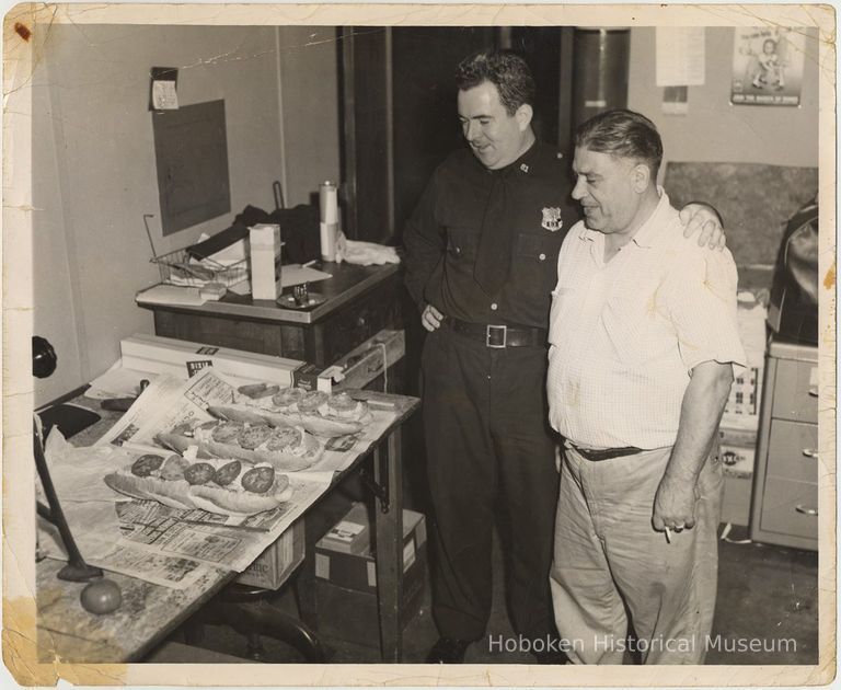 B+W photo of a police officer and Joseph 