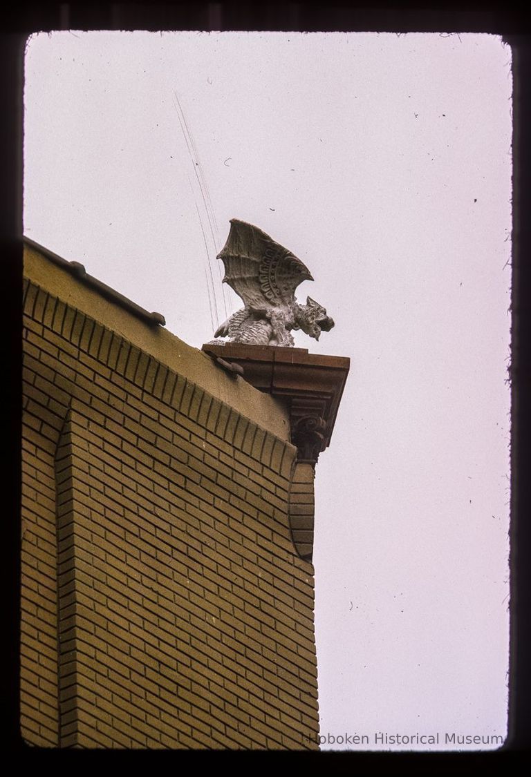 Color slide of close-up side view of gargoyle on a building on Jefferson and 4th picture number 1