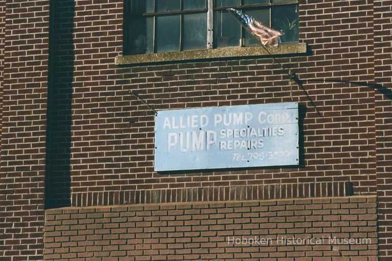 Color photo of wall sign for Allied Pump Corporation, 128 Harrison Street at Second St., Hoboken, Jan. 3 & 4, 2002. picture number 1