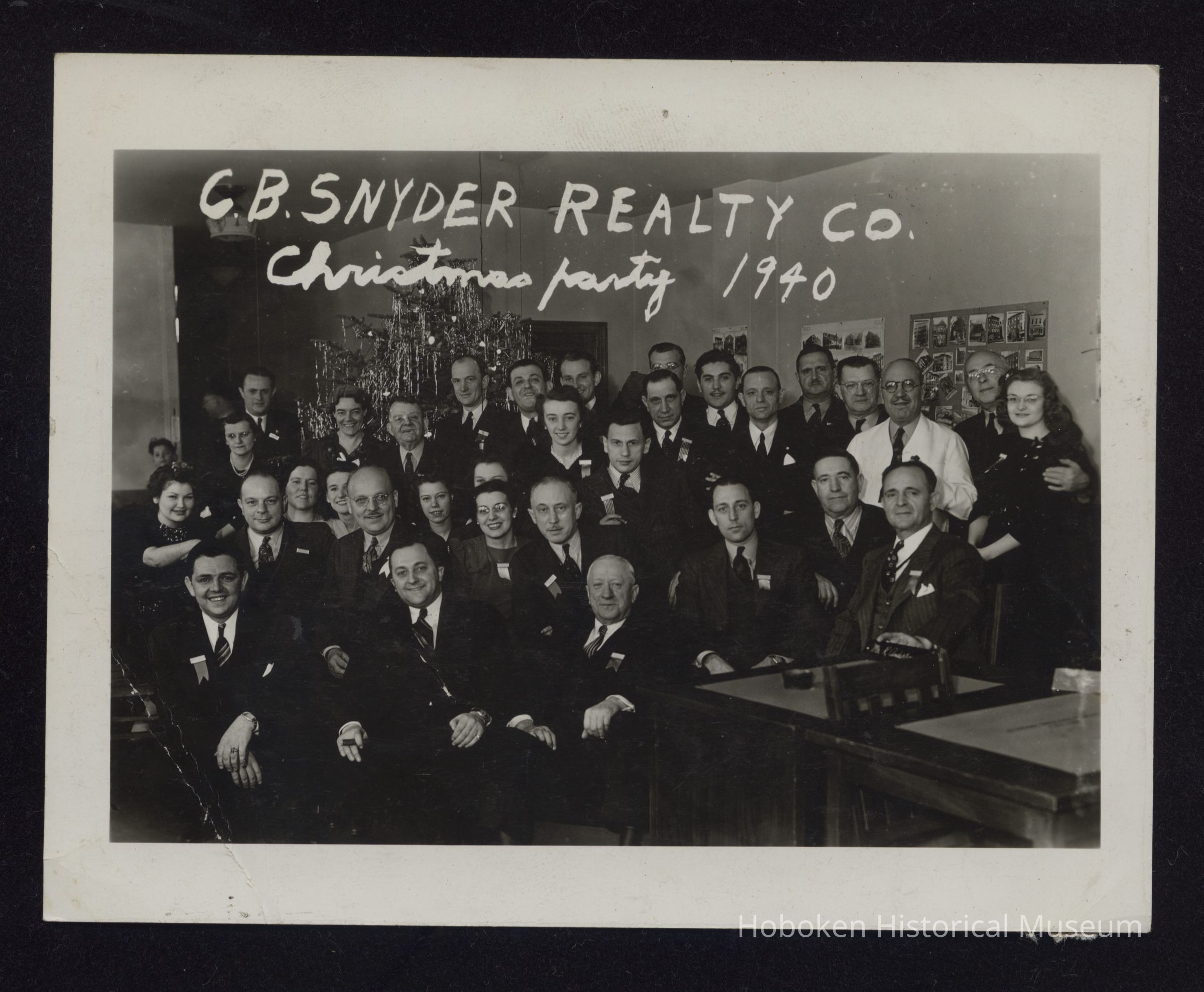 B&W photo of C.B. Snyder Realty Company employees dated 1940. picture number 1