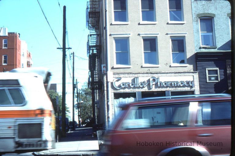 Color slide of the former Carollo's Pharmacy, 425 Washington St., corner of Fifth Street, Hoboken, November, 1983. picture number 1