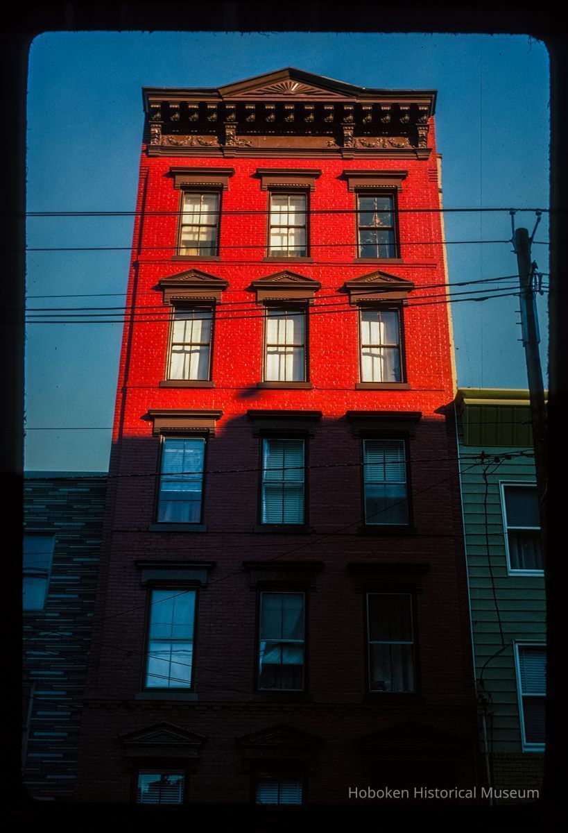 Color slide of eye-level view of façade, cornice, and pediment at 317 Grand between 3rd & 4th picture number 1