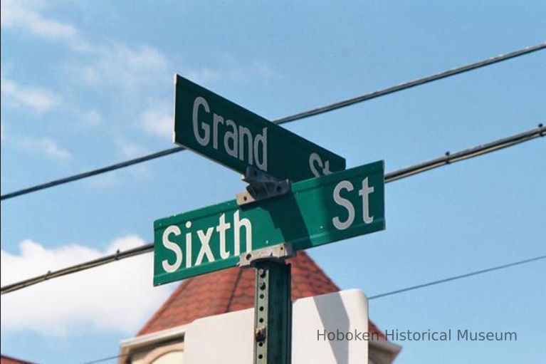 Color photo of street sign at the northwest corner of Sixth and Grand Sts. Hoboken, Sept., 1-5, 2001. picture number 1