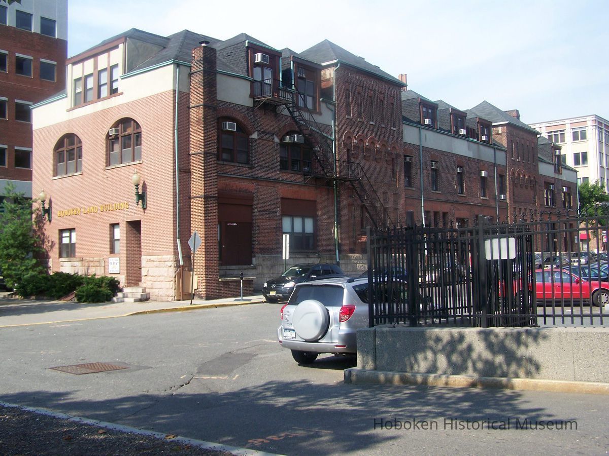 1: view southwestt of east and north facades from Sinatra Drive
