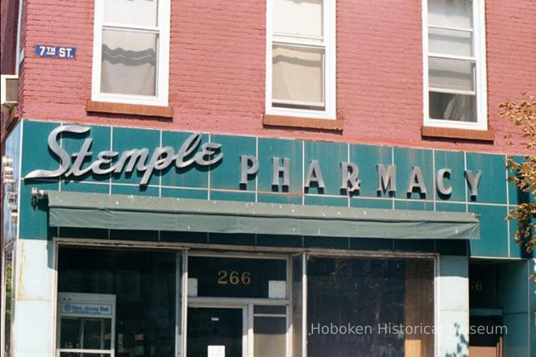 Color photo of building facade with sign for Stemple Pharmacy, 266 Seventh St. at Willow Avenue, Hoboken, Sept., 1-5, 2001. picture number 1