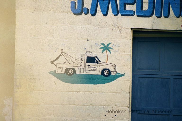 Color photo detail of painted sign on wall for J. Medina Auto Repair, near Jefferson and Fourth Sts., Hoboken, Jan. 3 & 4, 2002. picture number 1