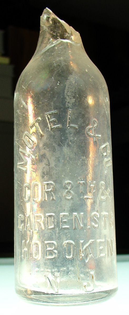 Bottle shard: Motel & Co., Cor 8th & Garden Sts., Hoboken, N.J. No date, ca. 1900. picture number 1