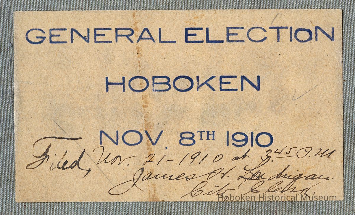 front cover detail: printed paper label with ink file notations