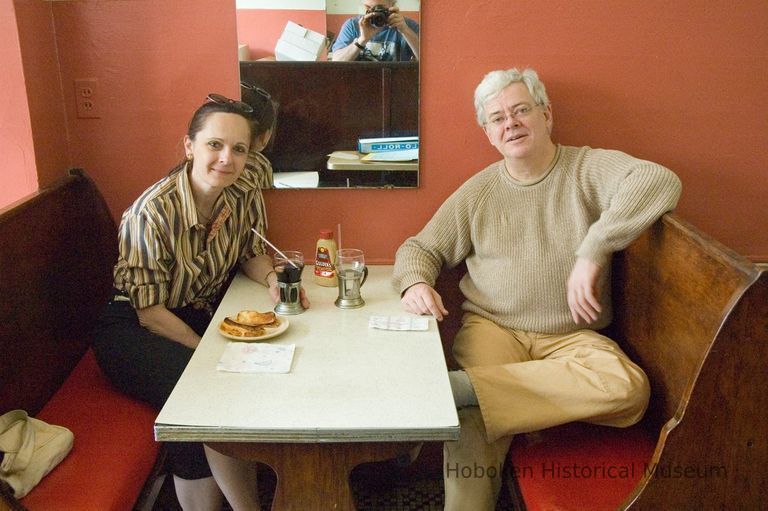 Color photo of 2 people eating in a booth at Schnackenberg's Luncheonette, Hoboken, August 8, 2006. picture number 1