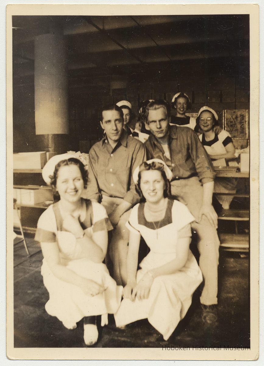 Sepia-tone group photo of Standard Brands Tea Dept. employees wearing work uniforms, Hoboken, n.d., ca. 1940. picture number 1