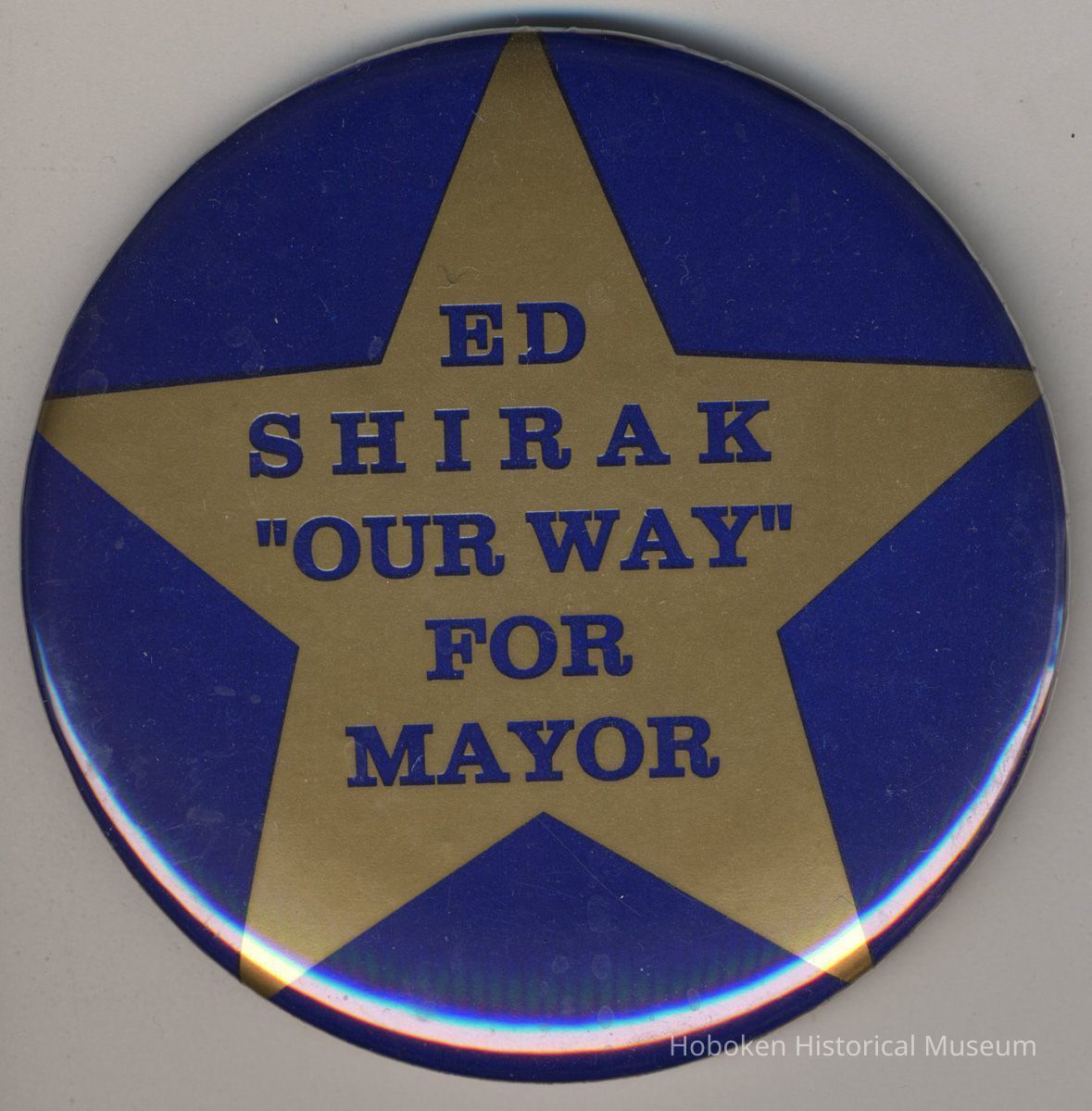 Button: Ed Shirak 