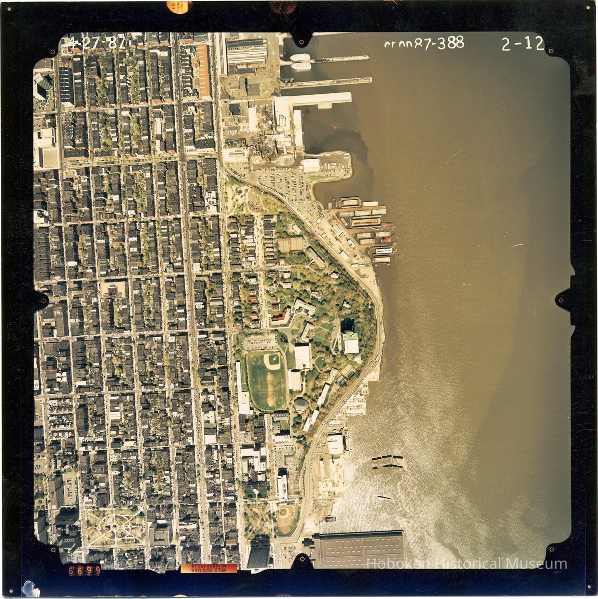 Color aerial photo of Hoboken from Clinton Street to the waterfront; 4th to 13th Streets, April 27,1987. picture number 1