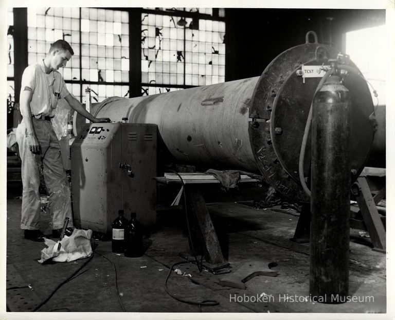 U.S. Testing, photo 1: onsite helium leak test