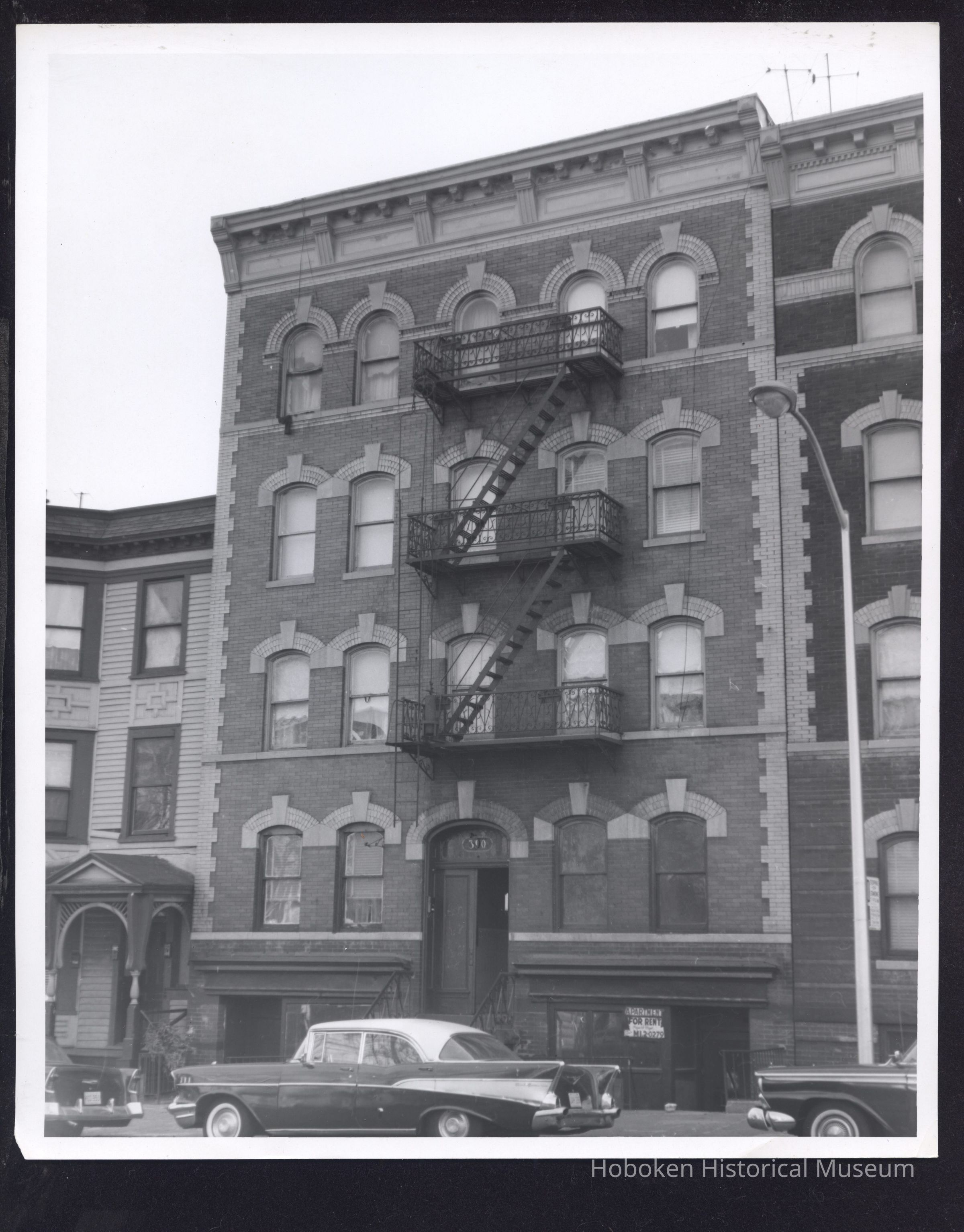 B&W photo of mixed-use row house apartment building at 390 Central Avenue, Newark. picture number 1