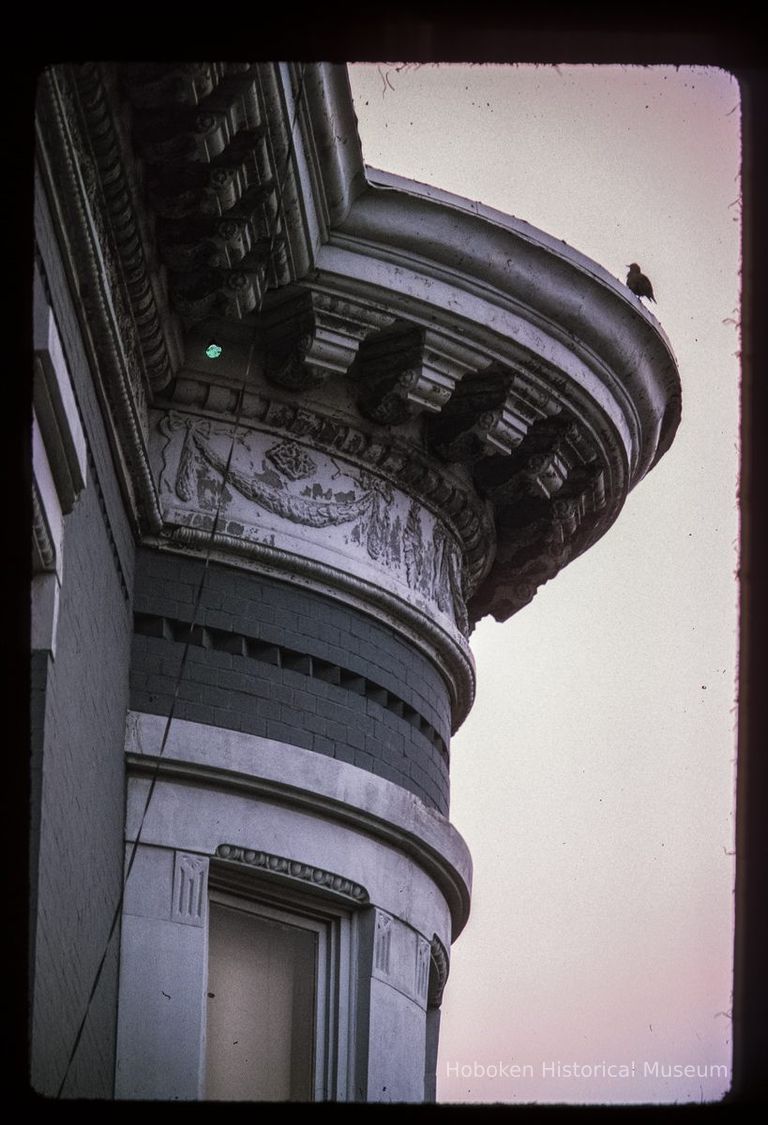 Color slide of close-up view of cornice, dentils, frieze and bay window at 1140 Garden on the SW corner with 12th picture number 1