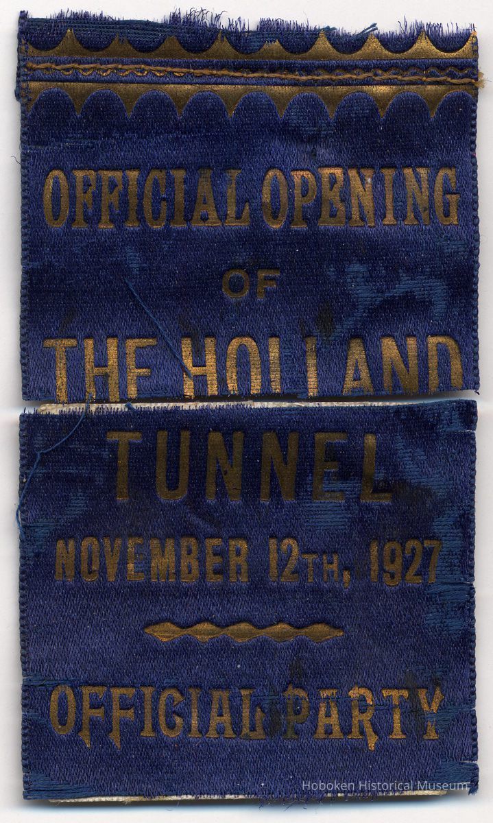 front with stamped lettering (in two pieces)