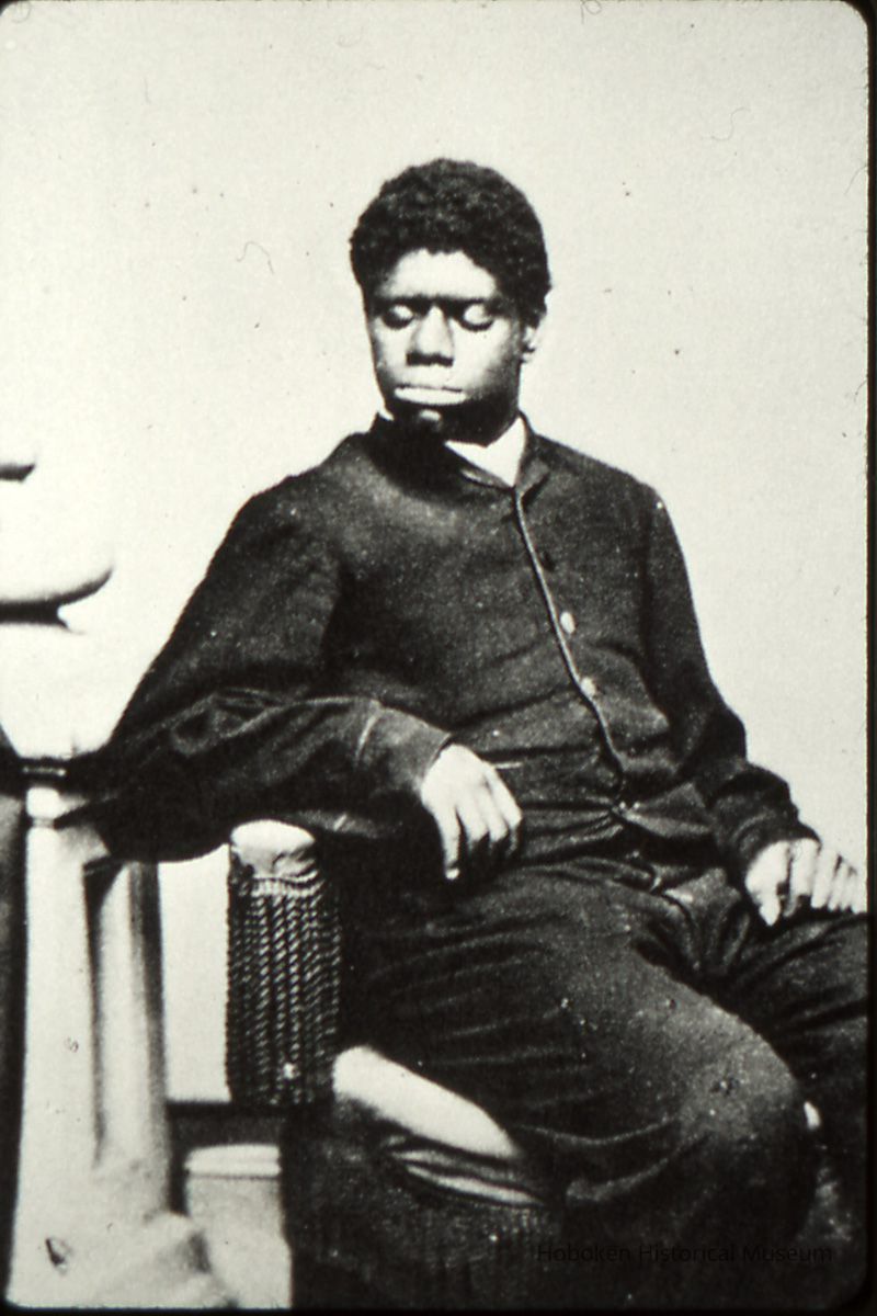 slide 1: photo posed in studio