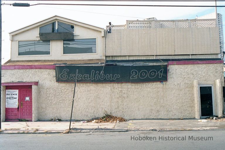 Color photo of the sign of the former Excalibur 2001 Bar, Hoboken, Jan. 3 & 4, 2002. picture number 1